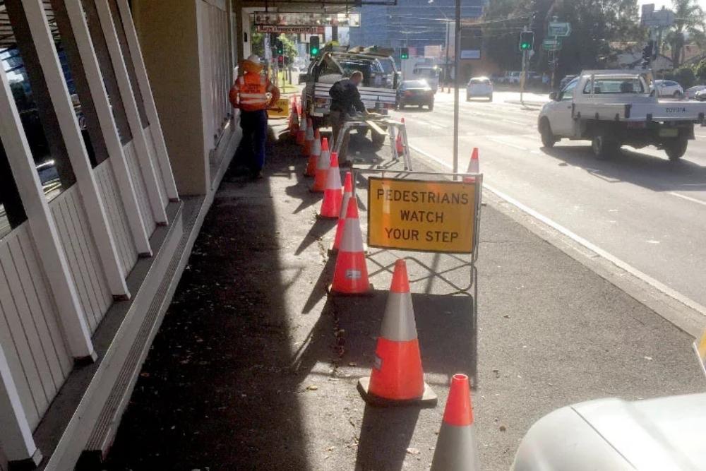 TC MAP pedestrian management plan implementation using high visibility safety cones and signage